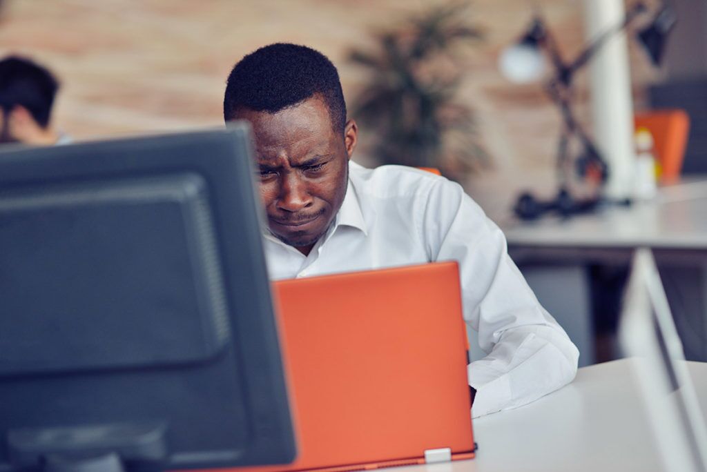 man experiencing triggers of trauma